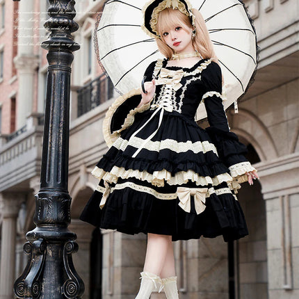 Elegant Black and Cream Lolita Dress with Multi-Tiered Ruffles and Detachable Apron
