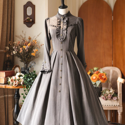 Long - striped dress with a tailored waistcoat, vintage charm in every stitch