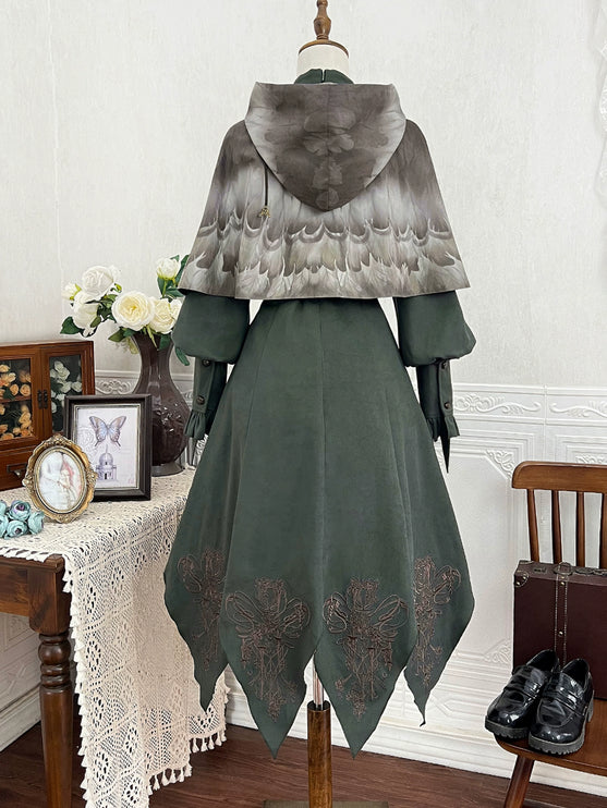 Fantasy - Style Capelet Dress with Embroidered Hem and Buckled Waist Belt