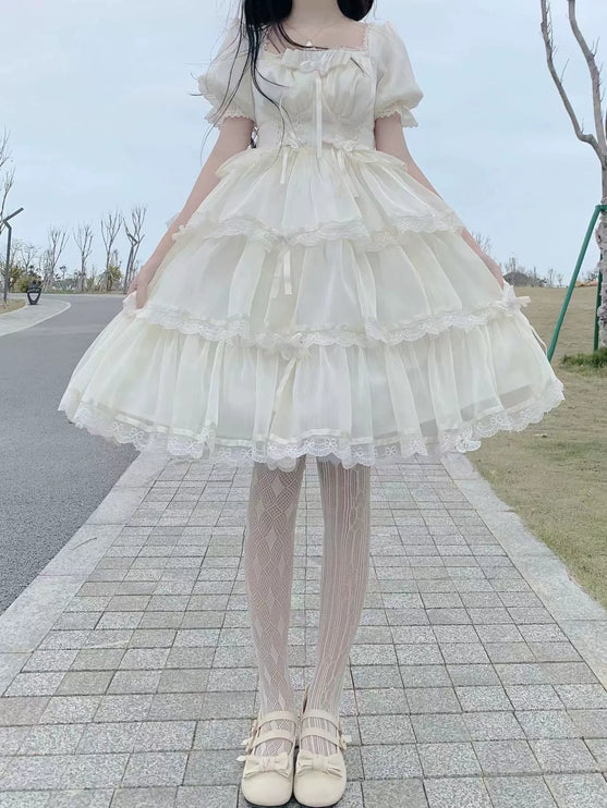 Elegant White Lolita Dress with Ruffled Skirt and Sheer Stockings
