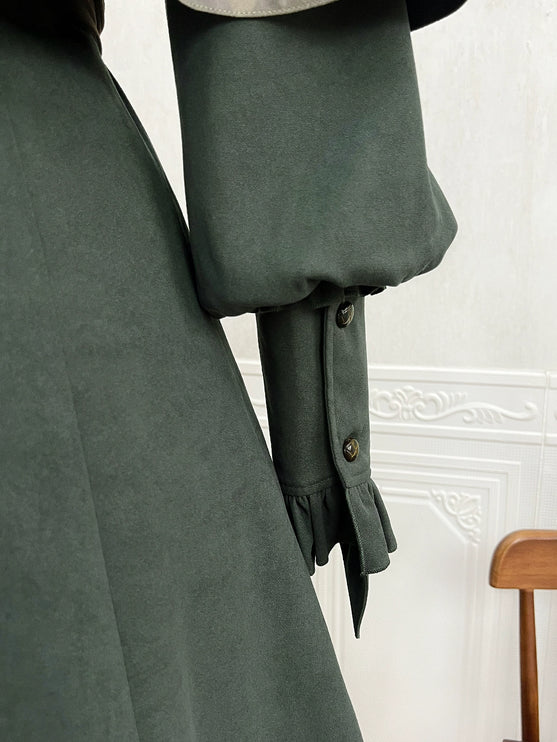 Fantasy - Style Capelet Dress with Embroidered Hem and Buckled Waist Belt