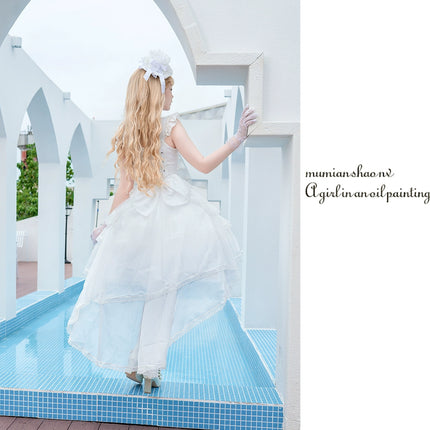 Elegant, lightweight wedding-style Lolita dress with a ballet-girl silhouette and ruffled details, inspired by cotton-candy motifs