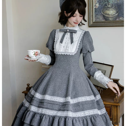 Two - piece Lolita dresses with capes, ruffled tiers and cute bowknots for a charming look