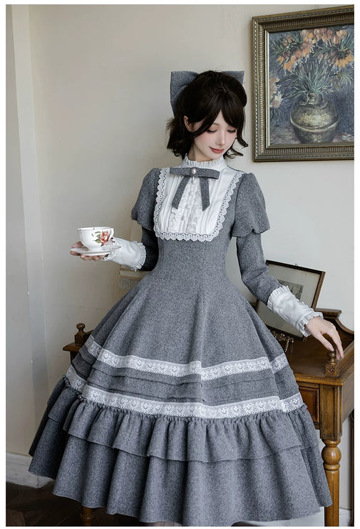 Two - piece Lolita dresses with capes, ruffled tiers and cute bowknots for a charming look