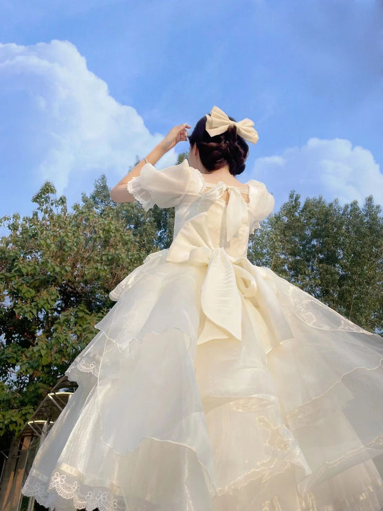 Elegant White Lolita Dress with Ruffled Skirt and Sheer Stockings