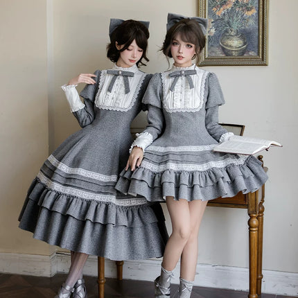Two - piece Lolita dresses with capes, ruffled tiers and cute bowknots for a charming look