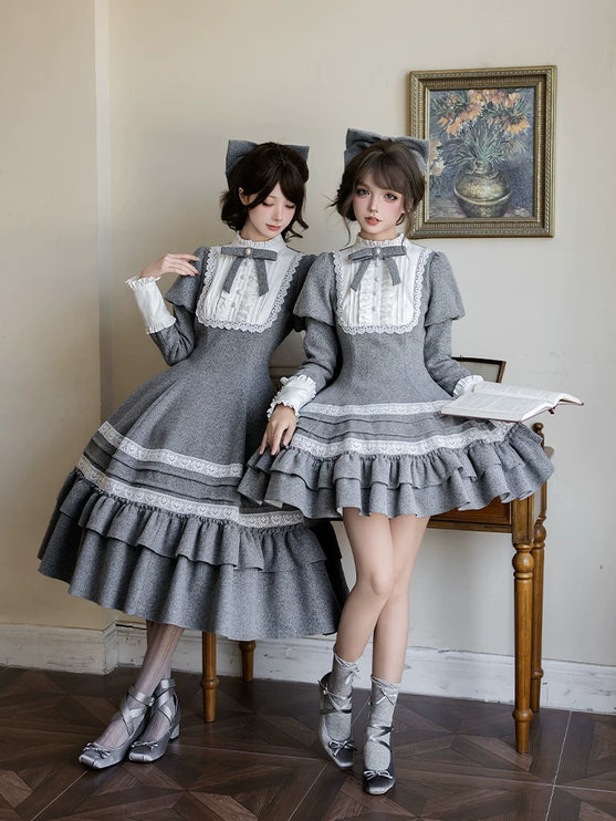 Two - piece Lolita dresses with capes, ruffled tiers and cute bowknots for a charming look