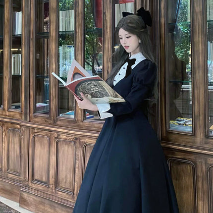 Elegant Victorian - inspired Black Dress with Bowknot and Flared Skirt
