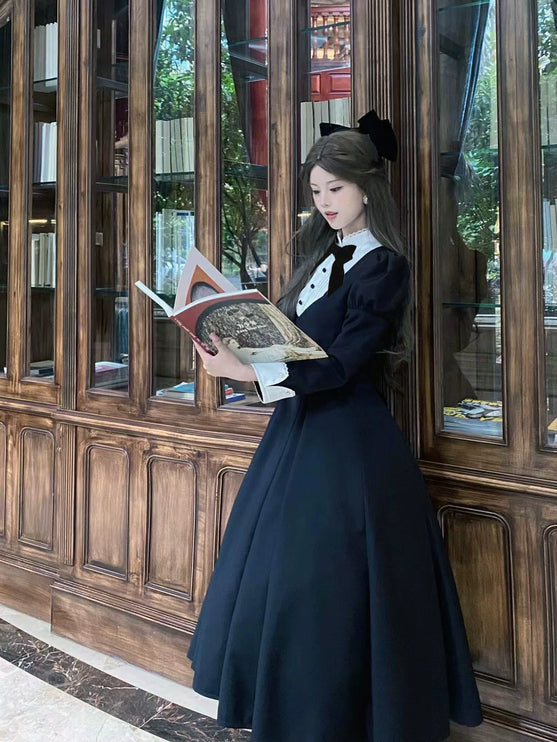 Elegant Victorian - inspired Black Dress with Bowknot and Flared Skirt