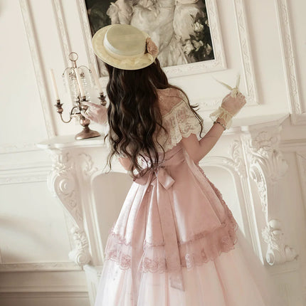 Vintage - inspired Pink Tea - length gown with Floral Lace and Tulle Layers, set for spring and summer