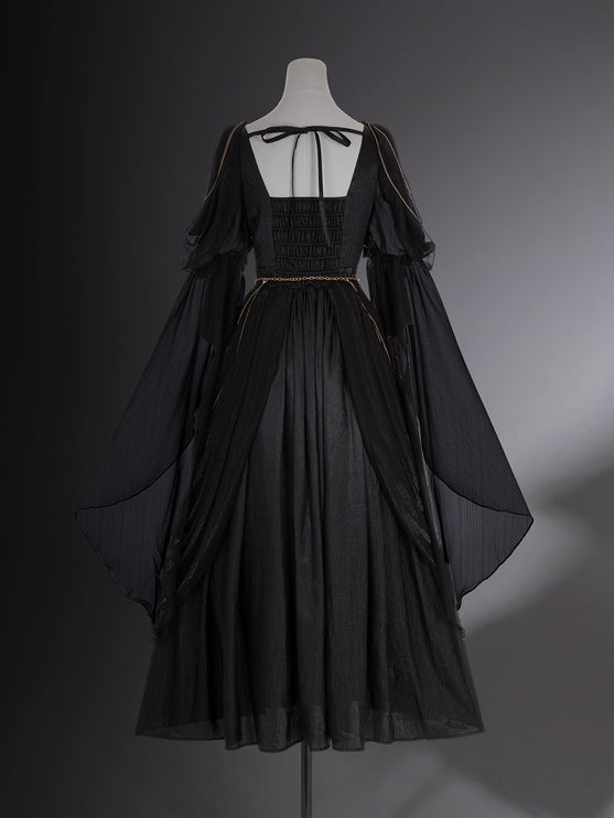 Dark fairy maxi dress: A perfect blend of lace and tassels